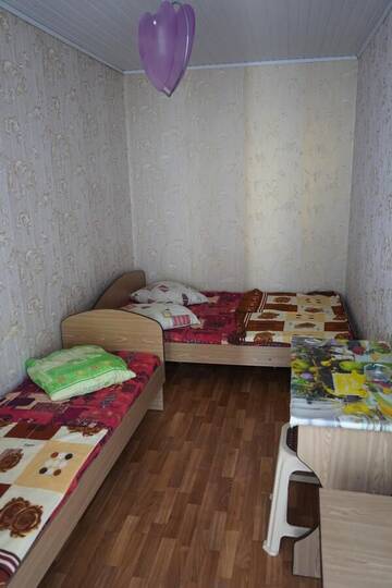 Фото номера Трехместный номер эконом-класса с общей ванной комнатой Мини-отель Баттерфляй г. Железный Порт 9